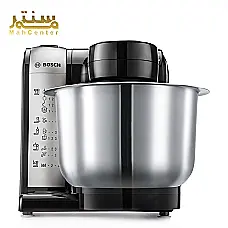 یک دستگاه غذاساز بوش با کاسه مخلوط کن و لوازم جانبی مختلف روی یک سطح سفید. - دوم