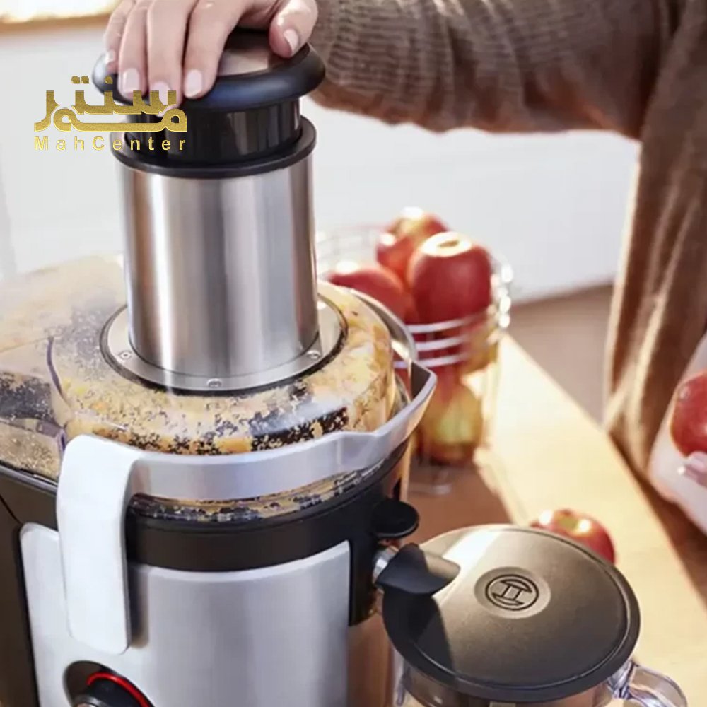 آبمیوه‌گیری بوش MES4010 در کنار میوه‌های رنگارنگ در آشپزخانه مدرن