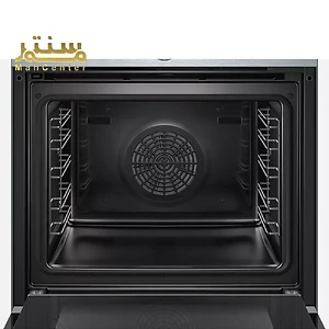 فضای داخلی فر با رنگ تیره و طبقات فلزی نشان داده شده است. در وسط فر، یک المنت گرد دیده می شود.