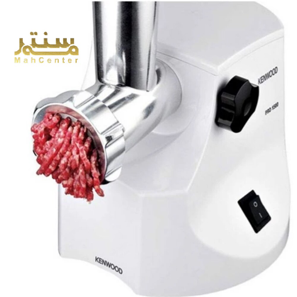 این تصویر یک چرخ گوشت برقی را نشان می‌دهد که در حال چرخ کردن گوشت است