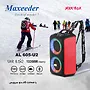 یک اسپیکر پرتابل با طراحی رنگی و بند شانه‌ای، مدل Maxeeder AL 605-U2، در کنار تصویر یک اسکی‌باز در حال حرکت در پیست برفی.