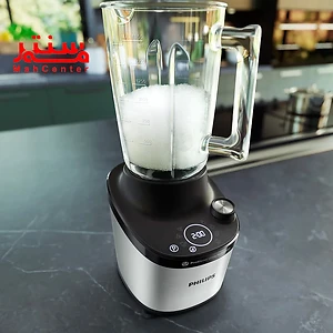 عکس مخلوط کن فیلیپس hr3760 که داخل پارچ آن یخ خرد شده است