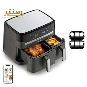 سرخ کن هوا تفال با دو کشو که یکی حاوی مرغ و دیگری سیب زمینی سرخ کرده است و یک توری سرخ کن در کنار آن قرار دارد.