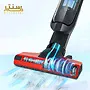 یک جاروبرقی بوش در حال تمیز کردن موی حیوانات از روی فرش است.