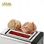 توستر نان استیل با دو نان گرد در حال تست، مناسب برای آماده‌سازی نان ترد و داغ.