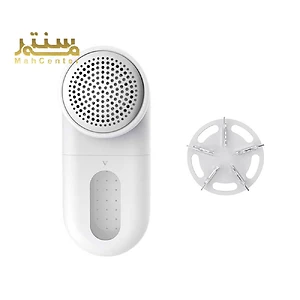 دستگاه پرزگیر لباس سفید با طراحی ارگونومیک و سری قابل تعویض، مناسب برای حذف پرز و کثیفی از روی پارچه‌ها و لباس‌ها.