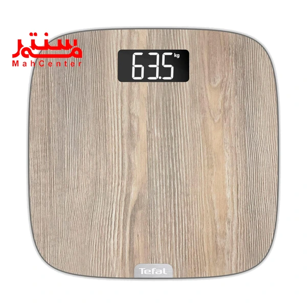 ترازو دیجیتال تفال مدل pp1600 که به طور کاملا صاف ایستاده است و صفحه نمایش 63.5 را نمایش می دهد.