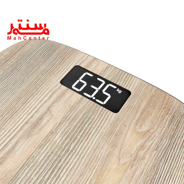 ترازو تفال 1600 که فقط قسمت بالای آن و صفحه نمایش آن مشخصه