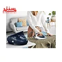 خانمی در حال اتو کردن لباس سدری رنگ با اتو مخزن دار تفال tefal-gv9720