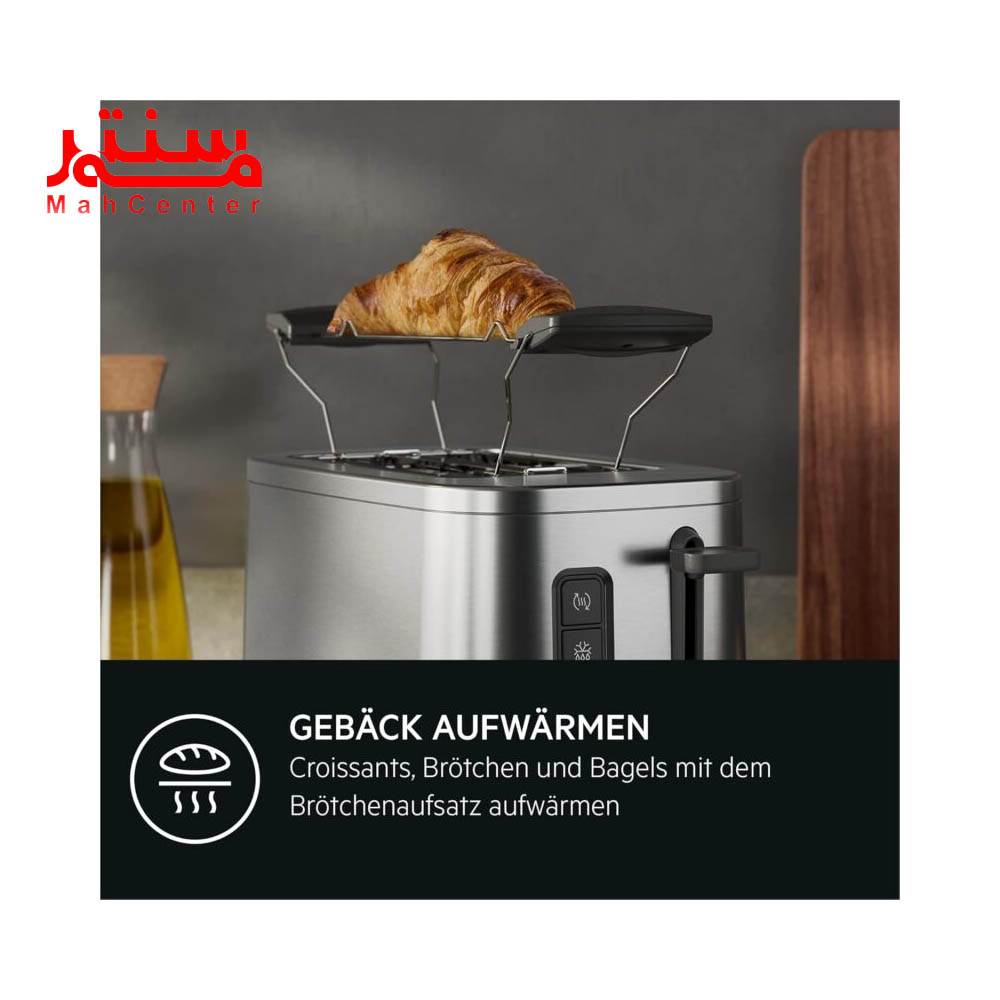 توستر آاگ مدل aeg-t-5-1-4-st در حال برشته کردن نان