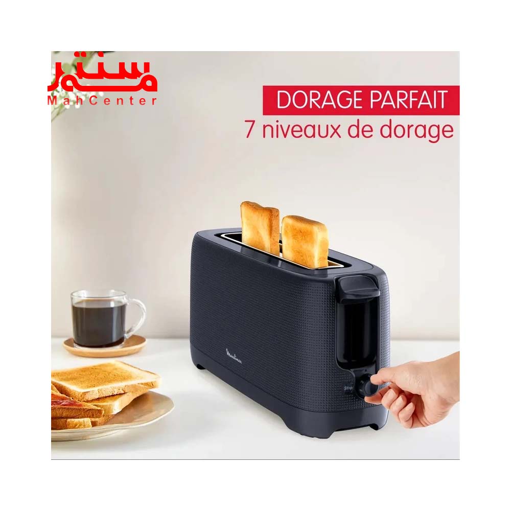 دستی در حال تنظیم دمای توستر مولینکس مدلls2m0810