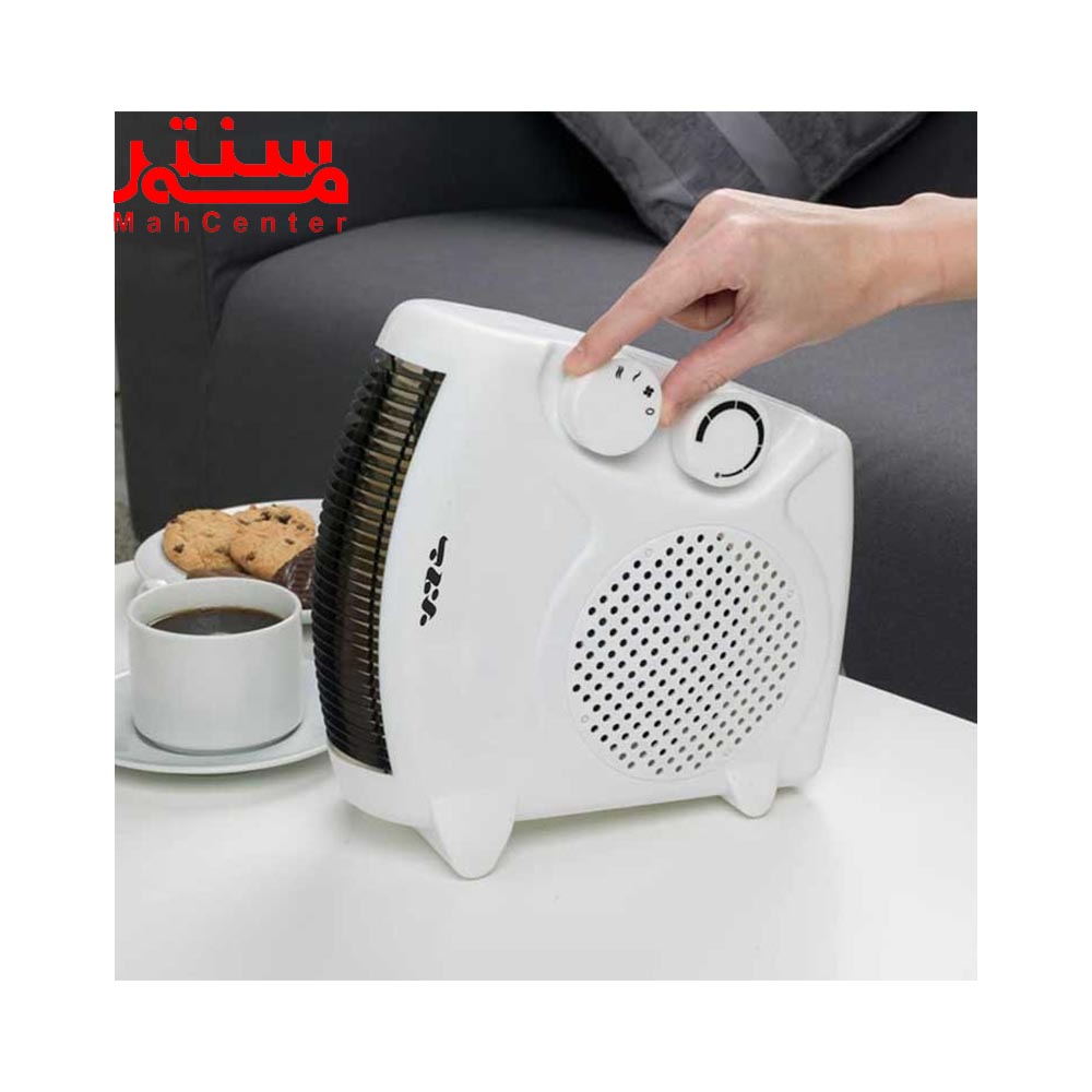 دستی در حال تنظیم حرارت بفن هیتر برفاب مدل qh2000