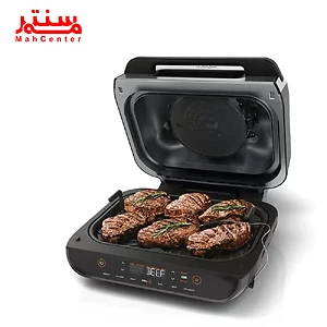 این تصویر یک دستگاه گریل  برقی  از  محصولات  نینجا   را  نشان  می‌دهد  که  در  حال  پختن  استیک  است.