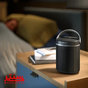 مردی در حال استراحت در دمای مناسب اتاق توسط فن هیتر فیلیپس مدل CX3120